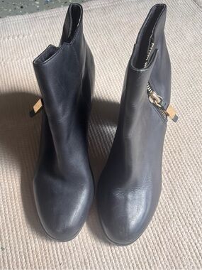 Aldo Black Leather Ankle Booties with Gold Zip Accent